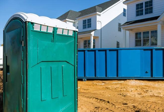 essential amenities at a bustling construction site portable toilets